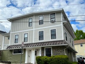 Bala Cynwyd apartment for rent - A two-story house with a grey and white exterior.