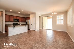 Gilbert house for rent - A kitchen with a refrigerator, microwave, and oven.
