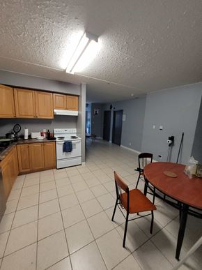 Waterloo apartment for rent - A kitchen with a table and chairs.