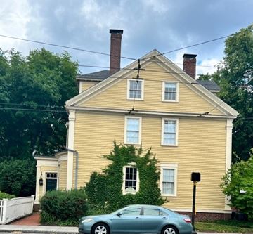 Cambridge apartment for rent - A house with a car parked in front.