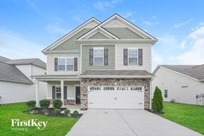 Murfreesboro house for rent - a white house with a white garage door