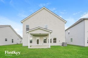 Murfreesboro house for rent - the outside of a white house with green grass