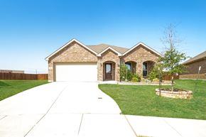 Anna house for rent - a house with a white garage door and a lawn