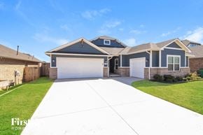 Yukon house for rent - a large white driveway in front of a house