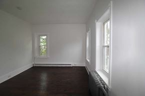 Chester apartment for rent - A room with a window and a radiator on the wall.
