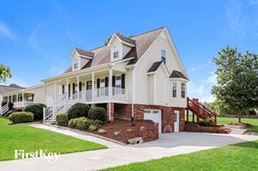 Lexington house for rent - a white house with a large porch and a staircase