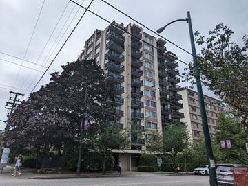 Vancouver apartment for rent - an apartment building on the corner of a street