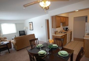 Westland Mi apartment for rent - a dining room and living room with a table and chairs