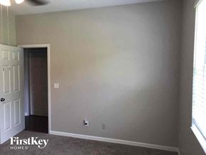 Lehigh Acres house for rent - A room with a door and a window.