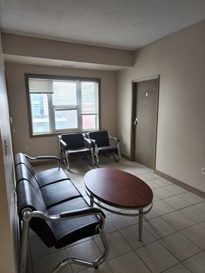 Waterloo apartment for rent - A waiting room with two chairs and a table.