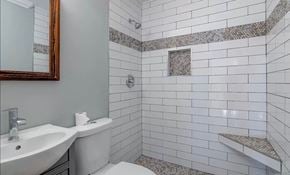 Simpsonville house for rent - a white bathroom with a sink and a toilet