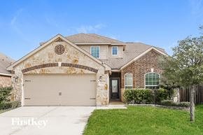 Hockley house for rent - A house with a garage and a driveway in front of it.