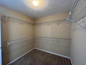 Hope Mills house for rent - our spacious closets are stocked with shelves and hooks for hanging clothes