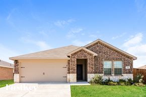 Josephine house for rent - a house with a garage door open in front of a lawn
