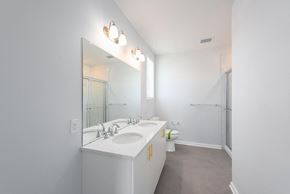 Atlantic Highlands apartment for rent - a bathroom with a sink and a shower and a mirror