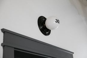Memphis apartment for rent - A white light bulb with the number 30 written on it.