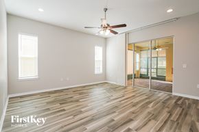 Winter Garden house for rent - the living room with hardwood flooring and a ceiling fan