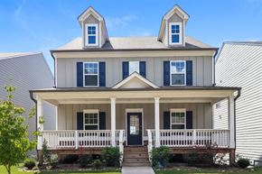 Canton house for rent - a house with a porch and two dormers on top of it