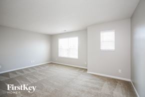 Westfield house for rent - a spacious room with white walls and a tiled floor