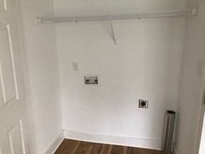 Franklinton apartment for rent - a empty room with white walls and a radiator
