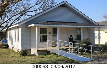 Franklinton apartment for rent - the front of a white house with a ramp