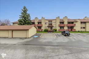 Anchorage apartment for rent - an empty parking lot in front of an apartment building