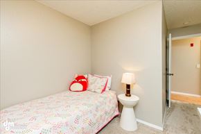 Anchorage apartment for rent - a bedroom with a bed and a toilet