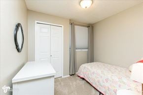 Anchorage apartment for rent - a bedroom with a bed and a closet