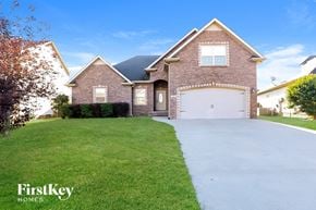 Clarksville house for rent - A house with a driveway in front of it.