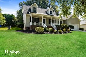 Trinity house for rent - a house with a lawn and a front yard