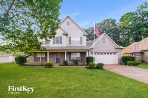 Olive Branch house for rent - a house with an flag in front of it