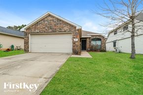 Conroe house for rent - A brick house with a garage is for sale.