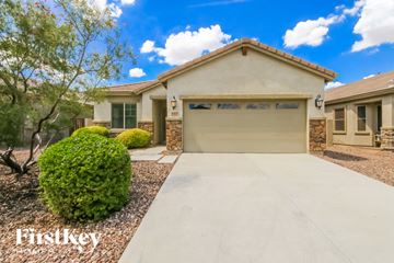 San Tan Valley house for rent - a home with a driveway and a garage door