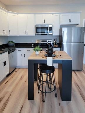 North Grafton apartment for rent - a kitchen with a center island and stainless steel appliances