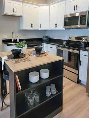 North Grafton apartment for rent - a kitchen with a counter and a stove and a microwave