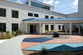 Landover apartment for rent - a courtyard in front of a building with a ball in the middle