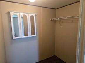 Shawnee house for rent - A small, empty room with a white shelf and a window.