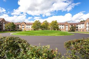 Southfield apartment for rent - an empty roundabout in front of an apartment building