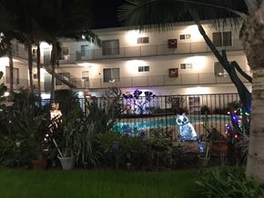 Long Beach apartment for rent - A pool with a lit up snowman in the background.