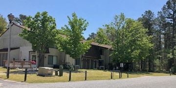 Mays Landing apartment for rent - a house with a yard and trees in front of it