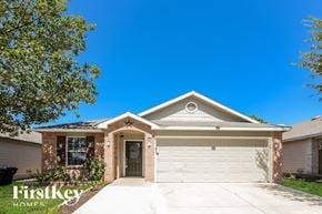 San Antonio house for rent - a home with a white garage door in front of it