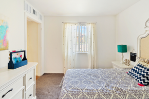 Apache Junction apartment for rent - a bedroom with a bed and a closet and a window