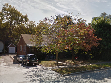Greensboro apartment for rent - a tree in front of a house with cars parked