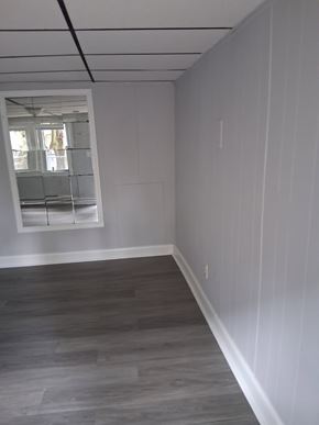Trenton apartment for rent - A room with a window and a grey floor.
