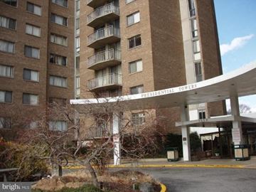 Adelphi apartment for rent - A large building with the words Presidential Towers on the front.