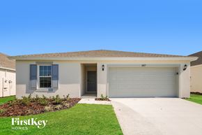 Davenport house for rent - A house with a garage door numbered 607 is for sale.