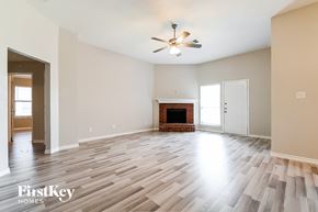 Lancaster house for rent - a living room with hardwood flooring and a fireplace