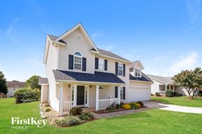 Mount Holly house for rent - a white house with black shutters and a lawn