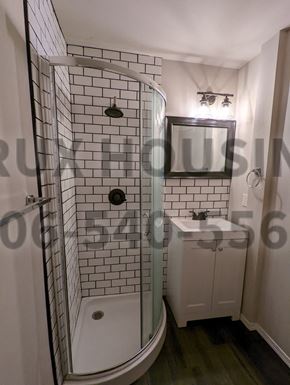 Great Falls apartment for rent - a small bathroom with a shower and a sink