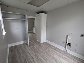 Great Falls apartment for rent - a bedroom with a closet and a sliding door